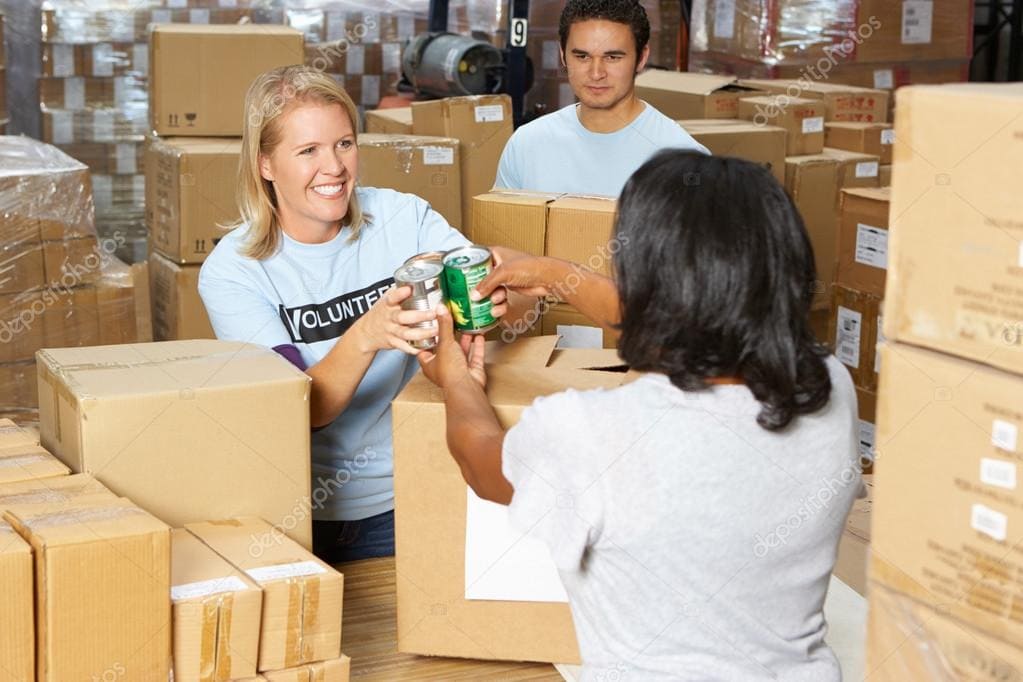 depositphotos 25048761 stock photo volunteers collecting food donations in